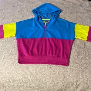 Soft, small, pink, blue & yellow Zumiez hoodie.